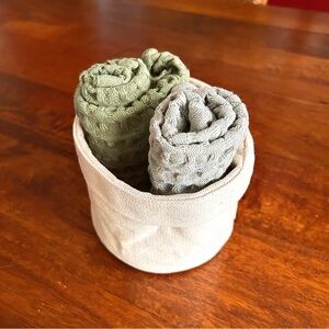 Green and Gray Textured Towels in Cream Basket